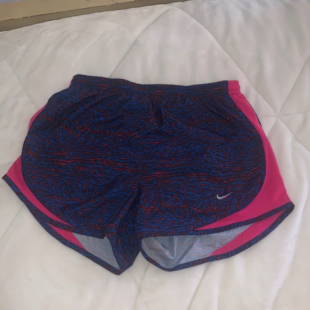 Blue and pink Nike shorts